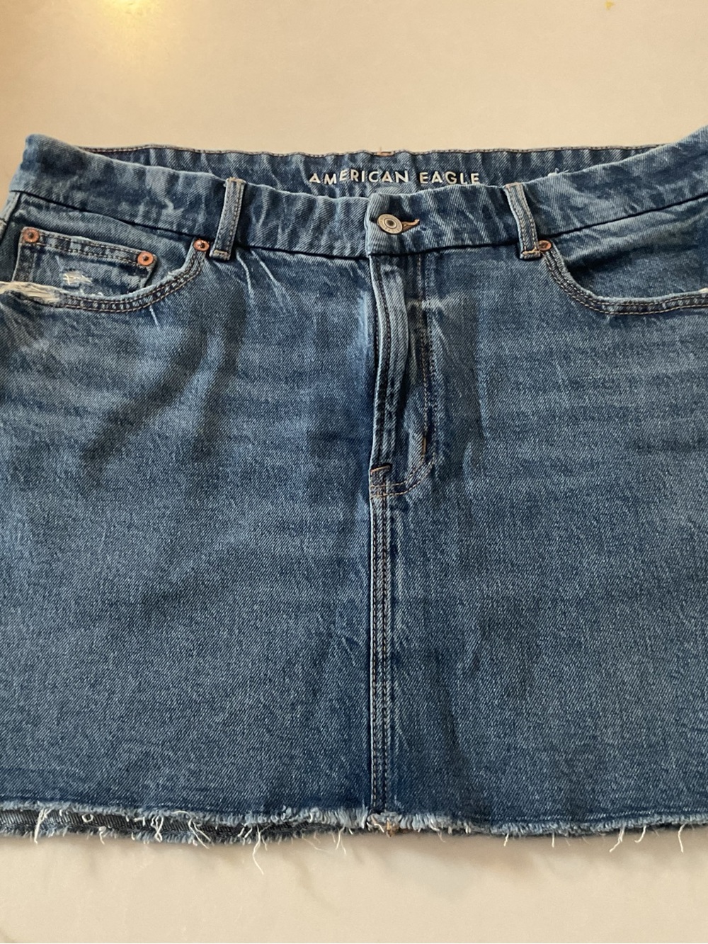 Distressed denim mini American eagle.
